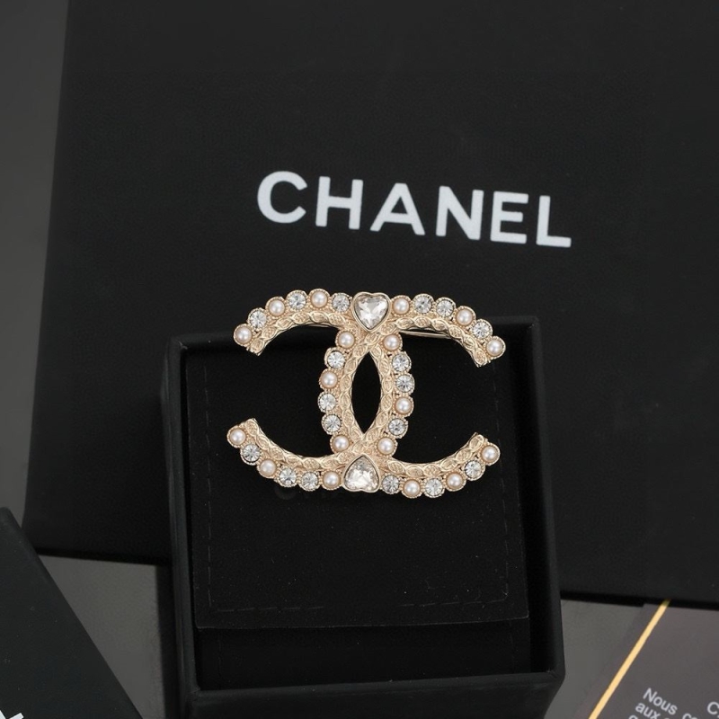 Ch*el brooches